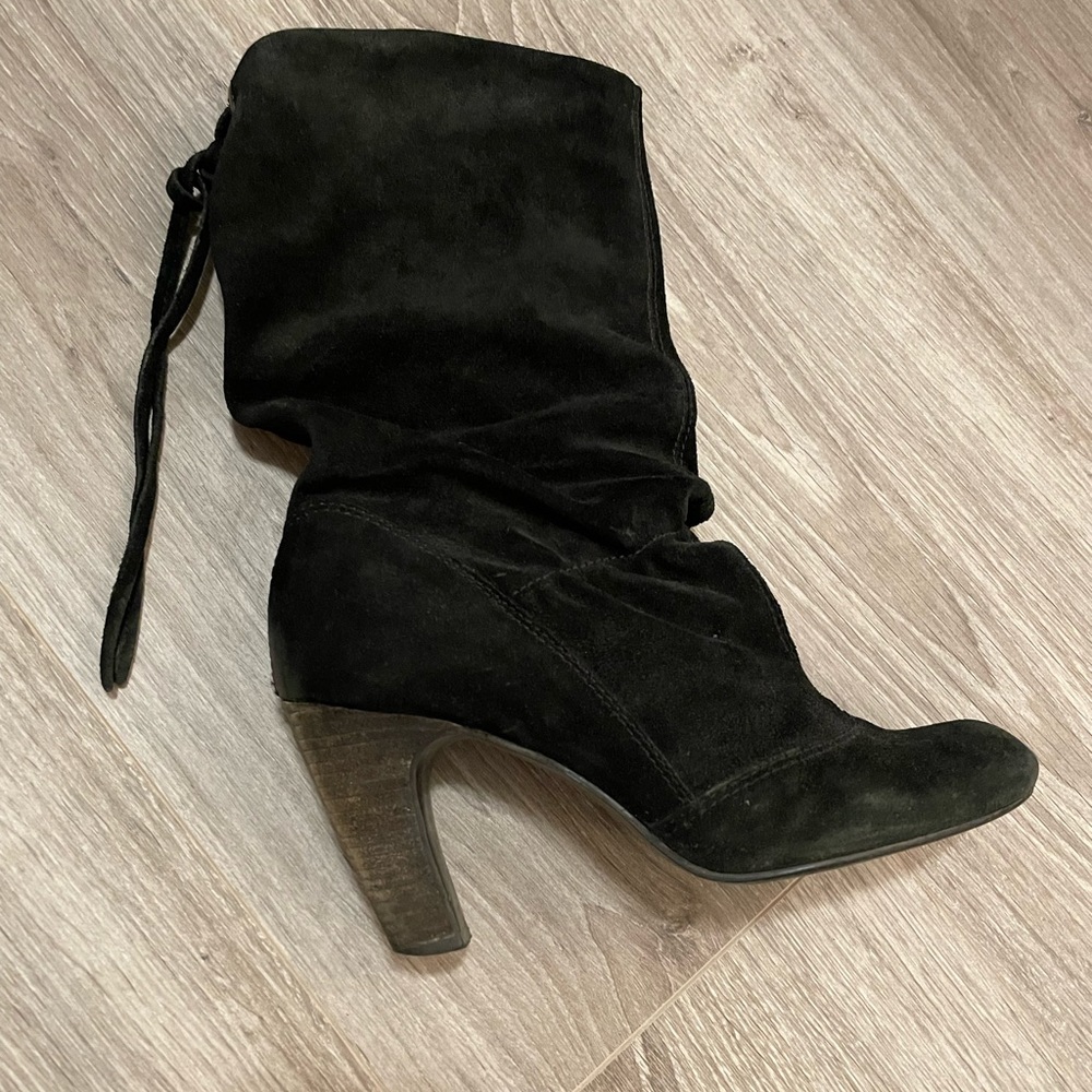 Mid calf high, slouchy leather upper boots with back tassel detail & alm…